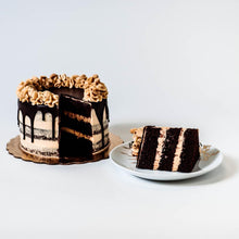 Load image into Gallery viewer, Cocoa and Fig Chocolate Chip Cake Sliced