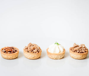 Mini pies, bourbon pecan pie, apple pie, key lime pie, strawberry rhubarb pie